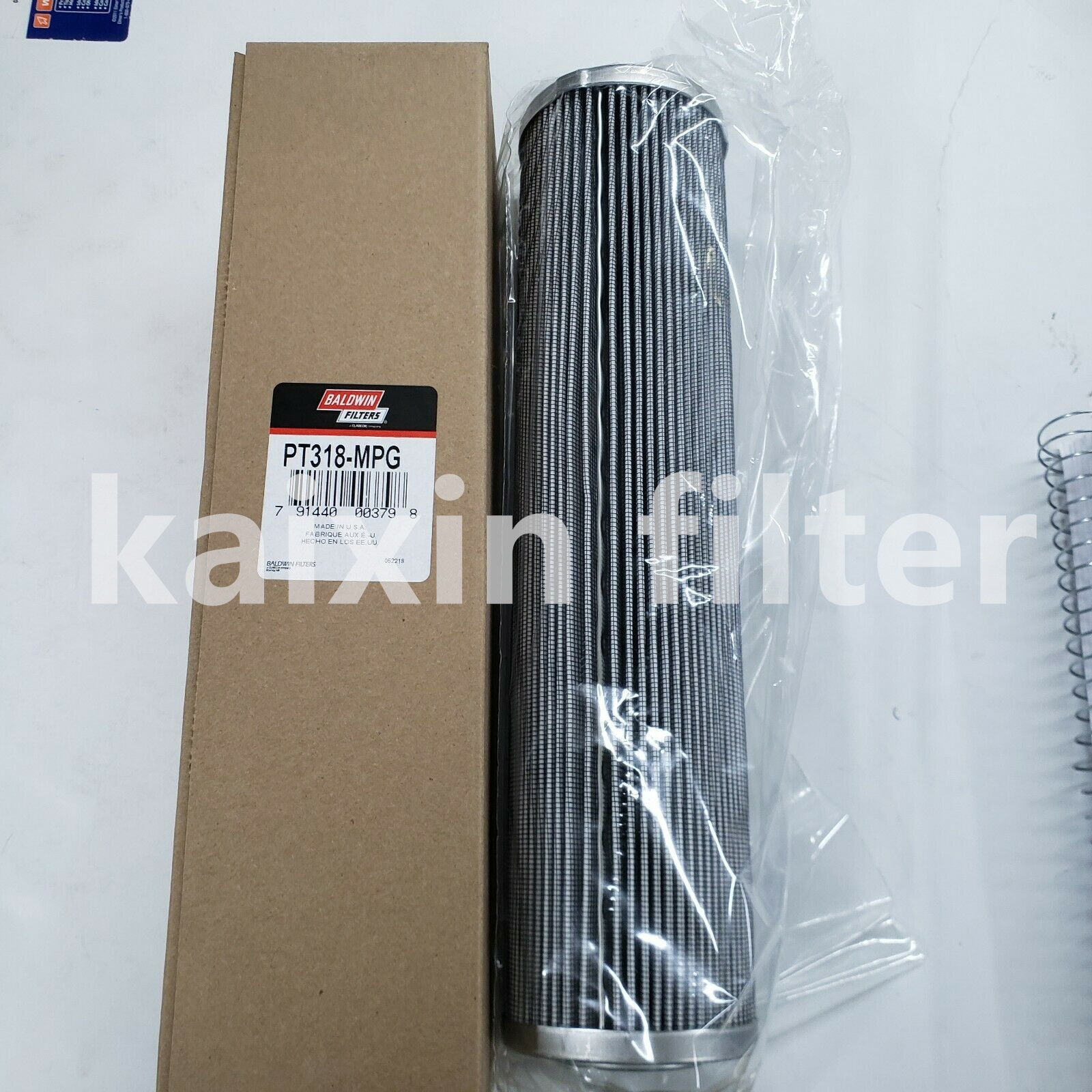 PT318-MPG Baldwin hydraulic spin-on filter canister on a white background.